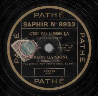 C'est Pas Comme Ça / Sous Les Toits De Paris